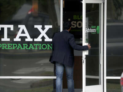 A customer enters a Block Advisors tax preparation office on April 15, 2019, in San Anselmo, California.