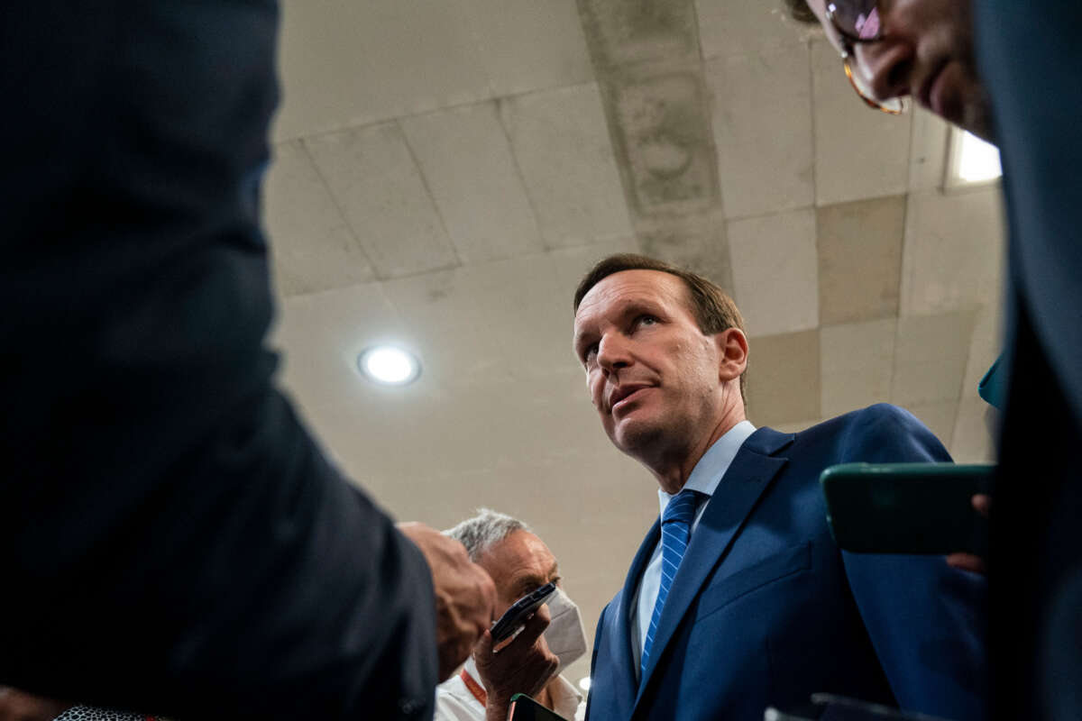 Sen. Chris Murphy speaks with reporters about ongoing negotiations regarding gun violence legislation in the Senate Subway on Capitol Hill on June 8, 2022, in Washington, D.C.