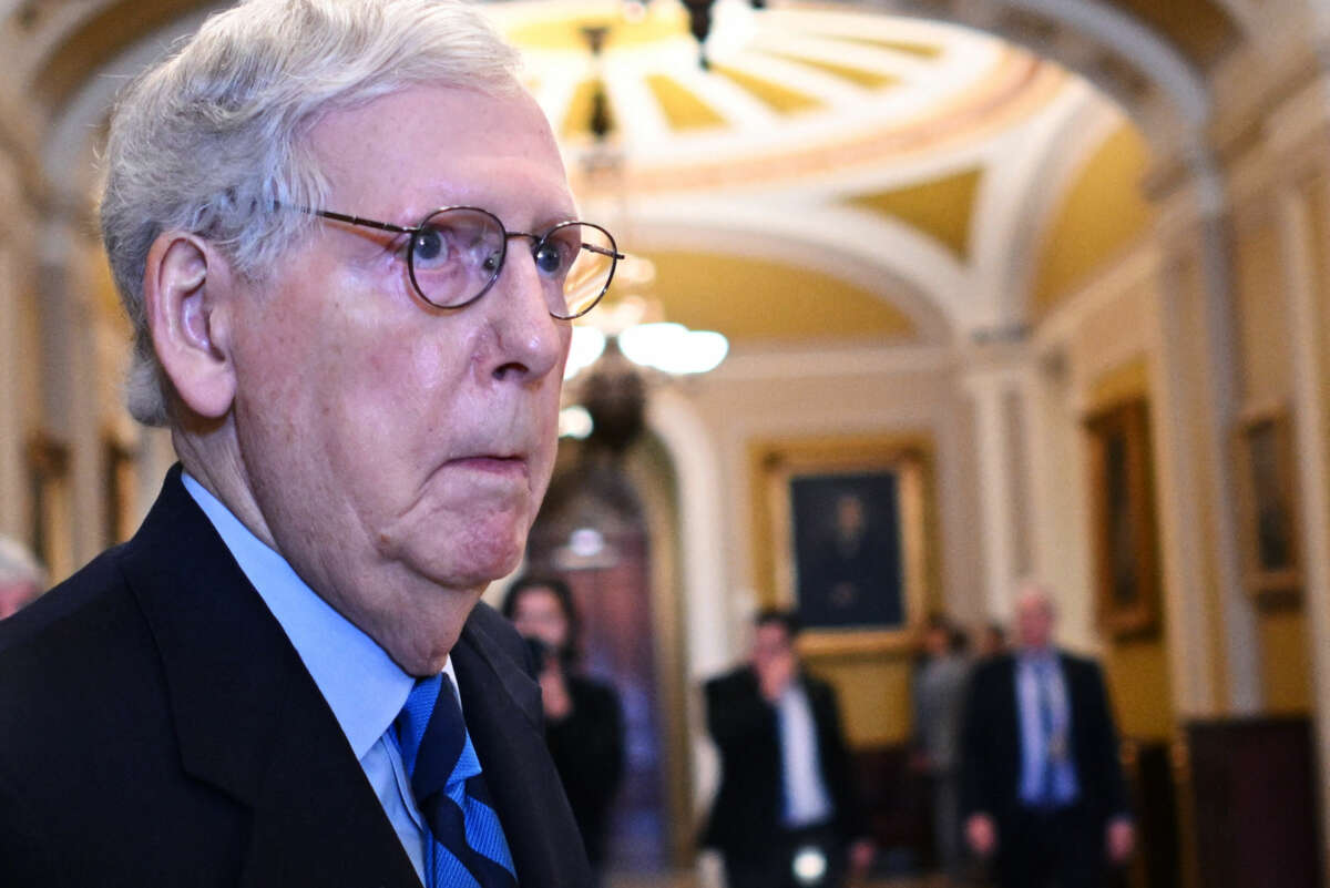 Mitch Mcconnell looks at something out of frame