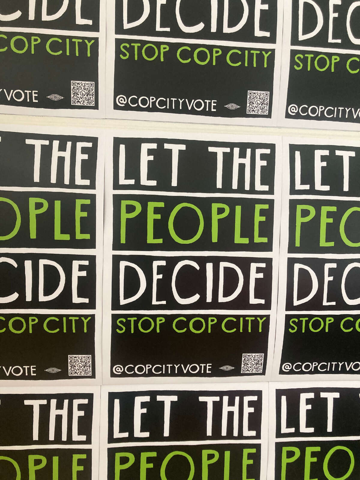 Vote to Stop Cop City posters