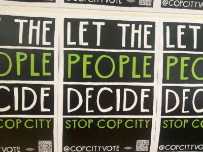 Vote to Stop Cop City posters
