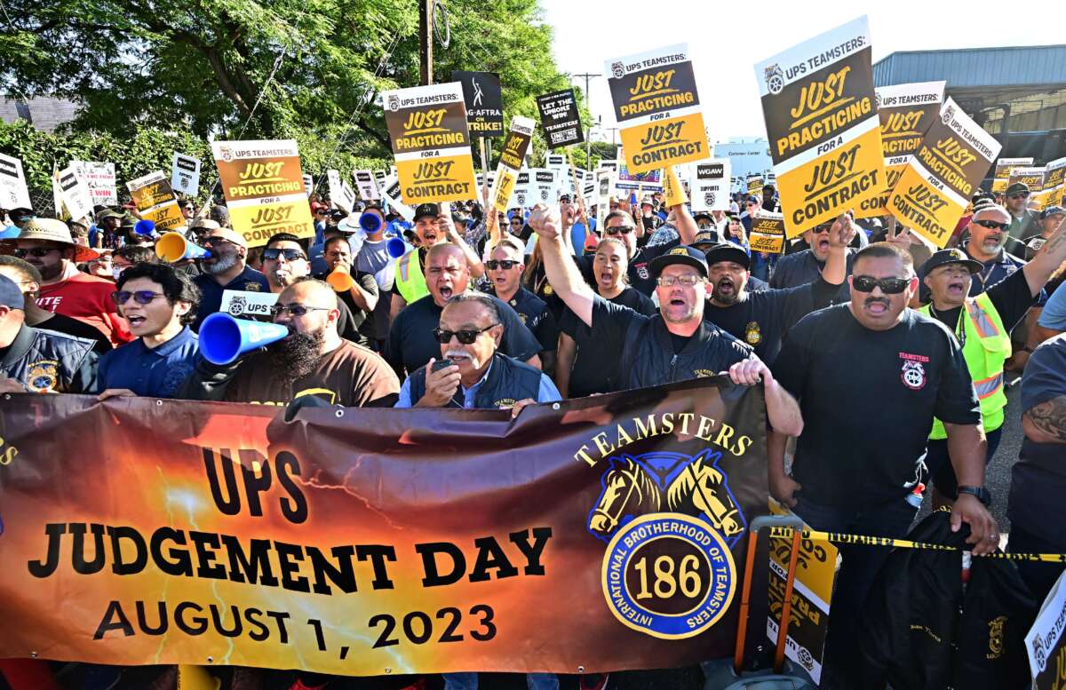 Members of the Writers Guild of America join UPS Teamsters during a rally ahead of possible UPS strike, in Los Angeles, California, on July 19, 2023.