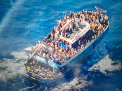 This undated handout image, provided by Greece's coast guard, appears to show an overcrowded fishing boat that later capsized and sank off the southern coast of Greece on June 14, 2023.