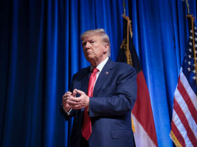 Former President Donald Trump leaves the stage after delivering remarks June 10, 2023, in Greensboro, North Carolina.