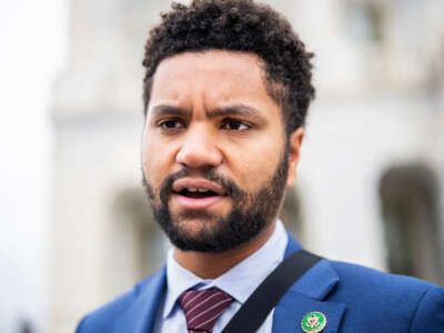 Rep. Maxwell Frost talks with reporters outside the U.S. Capitol on June 22, 2023.