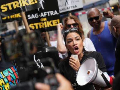 Rep. Alexandria Ocasio-Cortez joins the picket line as the SAG-AFTRA Actors Union Strike continues in front of Netflix on July 24, 2023, in New York City.