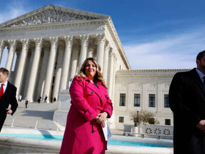 Lorie Smith, the owner of 303 Creative, a website design company in Colorado, arrives to speak to reporters outside of the U.S. Supreme Court Building on December 5, 2022, in Washington, D.C.