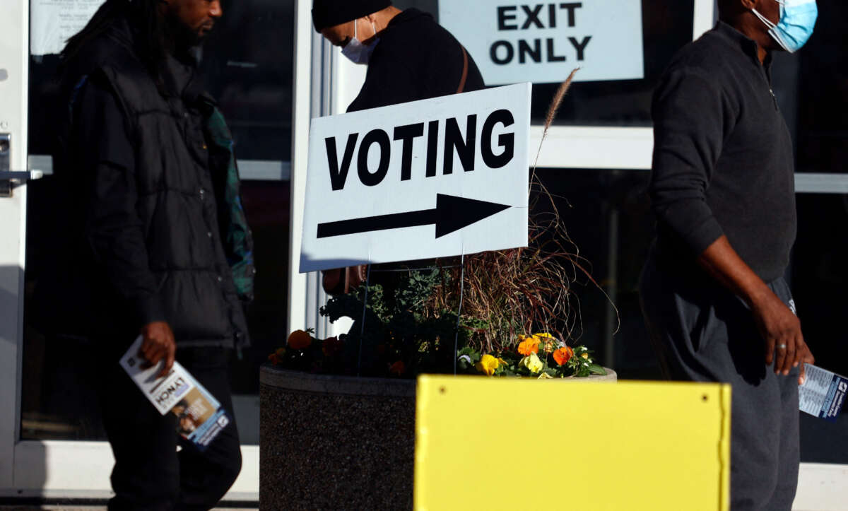 Voters wait in line to cast their ballot for early voting at the Franklin County Board of Elections, on the eve of the U.S. midterm elections, in Columbus, Ohio, on November 7, 2022.