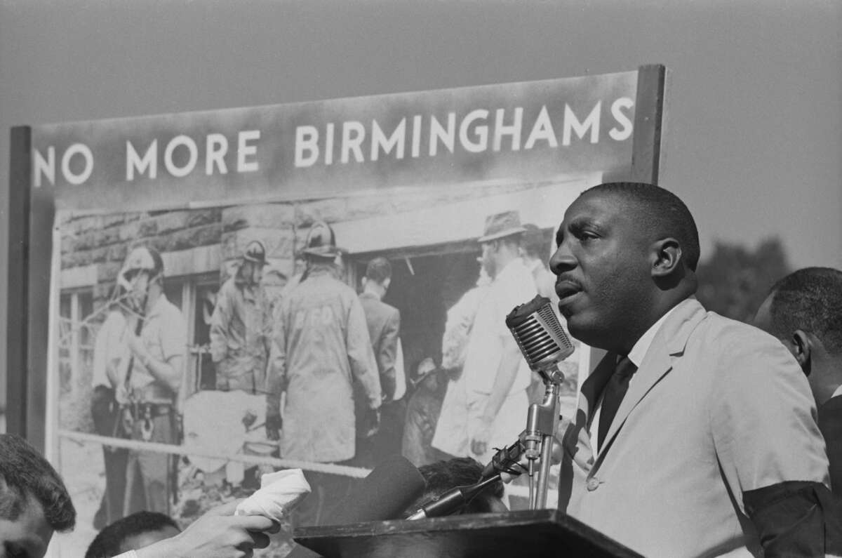 American comedian and Civil Rights activist Dick Gregory addresses a civil rights demonstration in Washington, D.C., in September 1963.