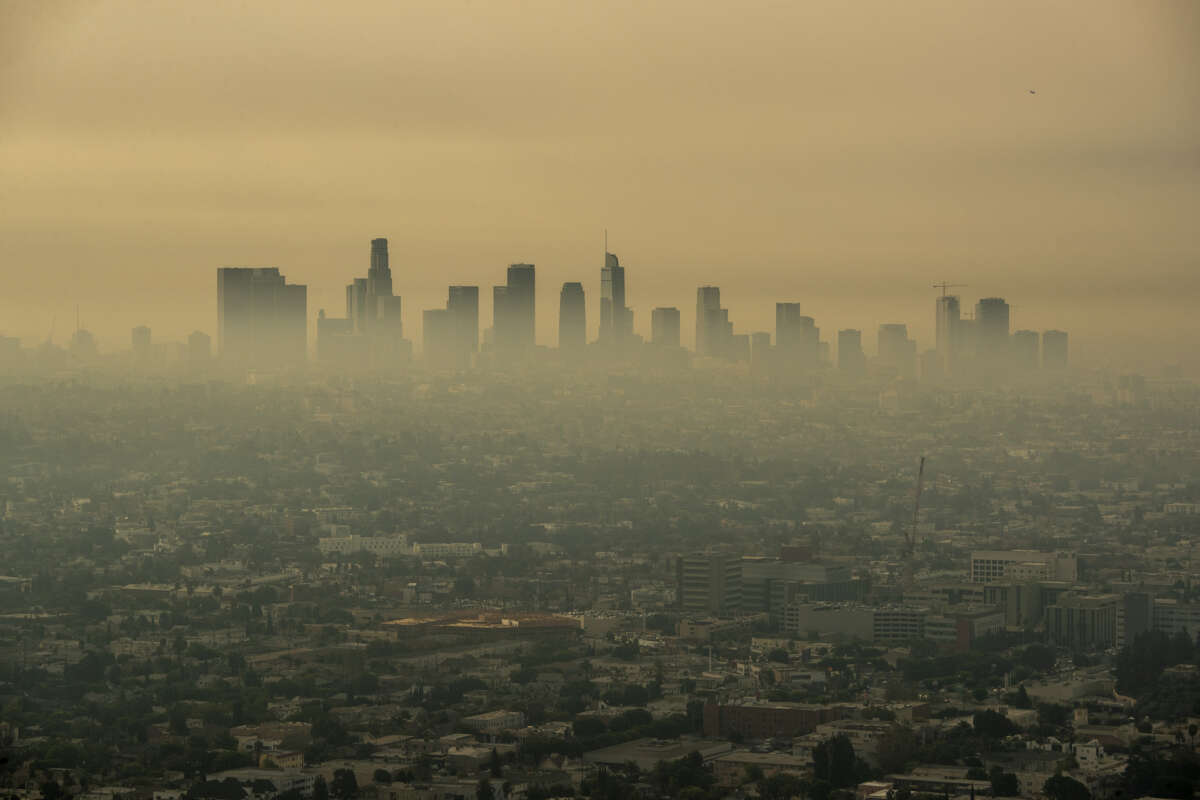 Smoke from Southern California wildfires drifts through the L.A. Basin, obscuring downtown skyscrapers on September 17, 2020 in Los Angeles, California.