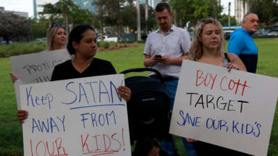Jennifer Vazquez and Melissa Caicedo protest outside of a Target store on June 1, 2023 in Miami, Florida.