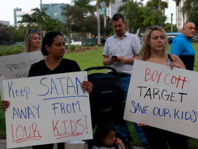 Jennifer Vazquez and Melissa Caicedo protest outside of a Target store on June 1, 2023 in Miami, Florida.