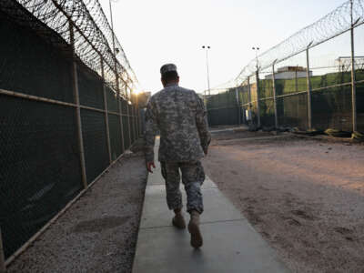 A guards walks into the Guantánamo Bay maximum security detention center on October 22, 2016, at the U.S. naval base in Guantánamo Bay, Cuba.