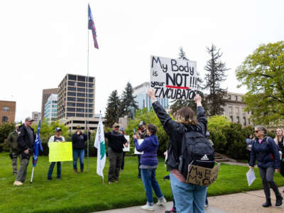 People participate in a rally for abortion rights outside of the Idaho Statehouse in downtown Boise on May 14, 2022.