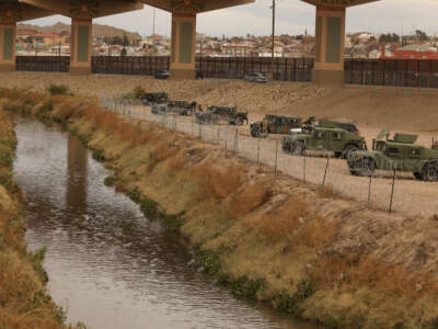 National Guard agents monitor the banks of the Rio Grande on the border between El Paso, Texas, United States, and Ciudad Juarez, Chihuahua state, Mexico, on December 28, 2022.