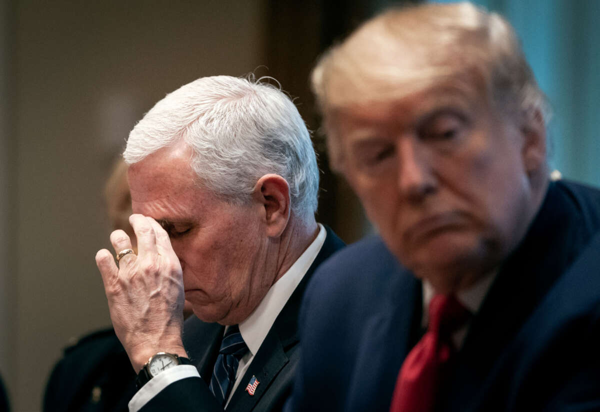 Vice President Mike Pence and President Donald Trump attend a meeting with the White House Coronavirus Task Force and pharmaceutical executives in Cabinet Room of the White House on March 2, 2020, in Washington, D.C.