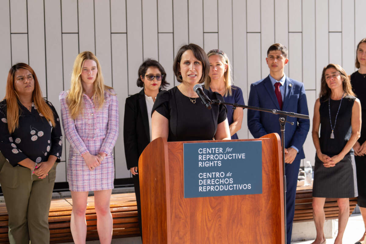 Center for Reproductive Rights attorney Molly Duane speaks during a press conference outside the Travis County Courthouse in Austin, Texas, on July 20, 2023.