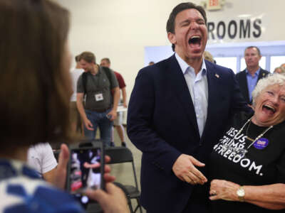 Florida Gov. Ron DeSantis greets guests at Ashley's BBQ Bash hosted by Congresswoman Ashley Hinson on August 6, 2023, in Cedar Rapids, Iowa.