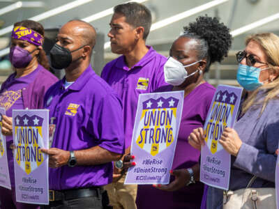 Members of the SEIU Local 721 hold a press conference outside LAC+USC Medical Center on May 26, 2022, in Los Angeles, California.