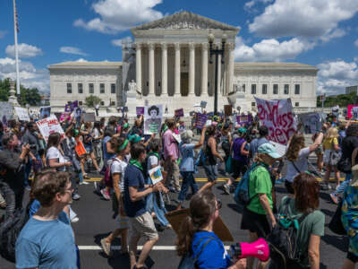 Abortion rights activists demonstrate outside of the Supreme Court during a Women's March in Washington, D.C., on June 24, 2023.