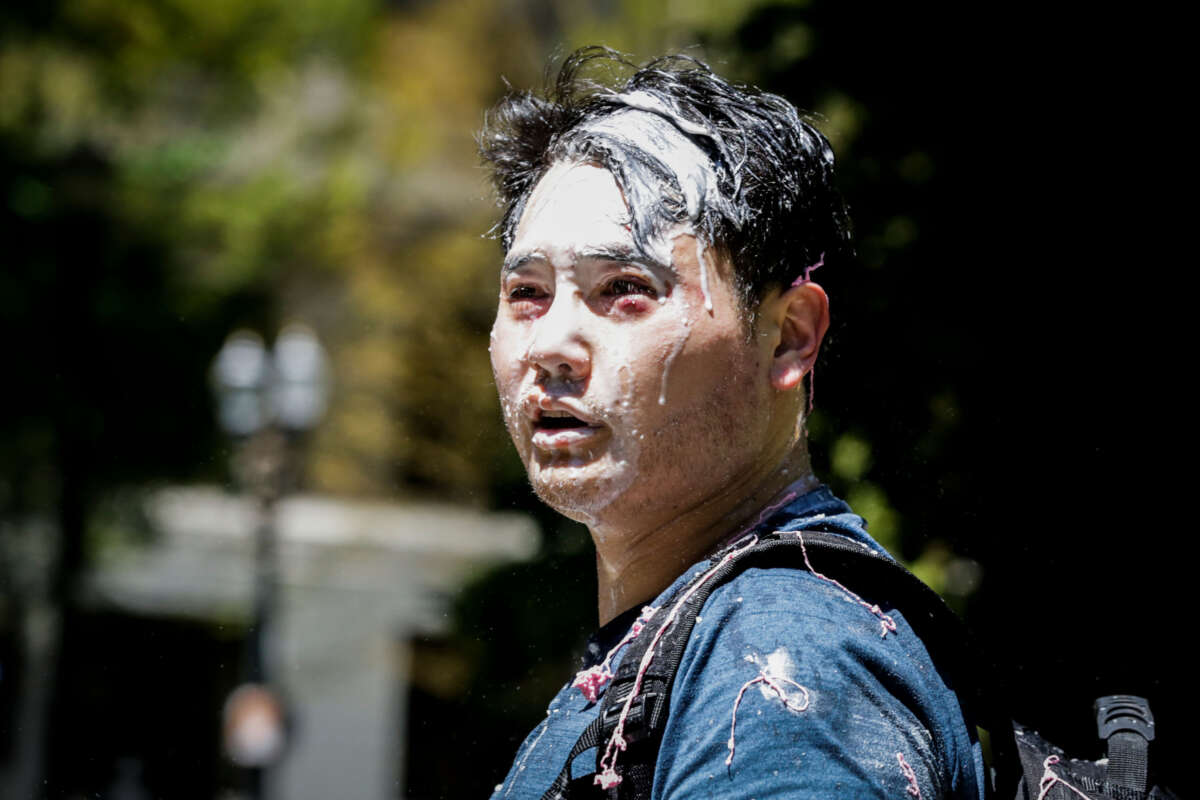 Andy Ngo is seen covered in an unknown substance thrown by unidentified counterprotesters on June 29, 2019, in Portland, Oregon.