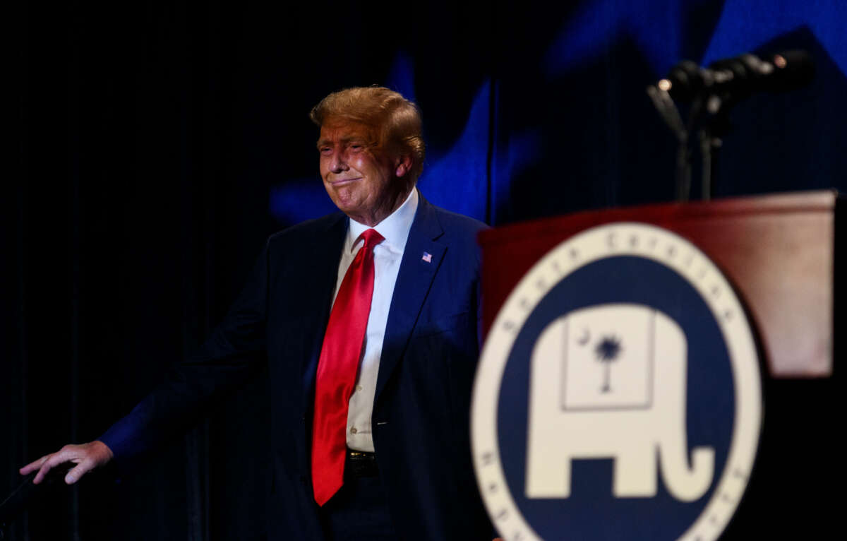 Former President Donald Trump pauses for cheers from the crowd before speaking as the keynote speaker at the 56th Annual Silver Elephant Dinner hosted by the South Carolina Republican Party on August 5, 2023, in Columbia, South Carolina.
