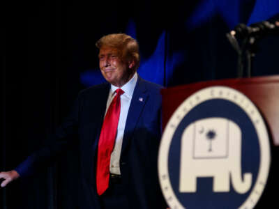 Former President Donald Trump pauses for cheers from the crowd before speaking as the keynote speaker at the 56th Annual Silver Elephant Dinner hosted by the South Carolina Republican Party on August 5, 2023, in Columbia, South Carolina.