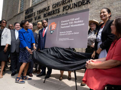 A temporary sign is unveiled for the Emmett Till and Mamie Till-Mobley National Monument site at Roberts Temple Church of God on August 1, 2023, in Chicago, Illinois.