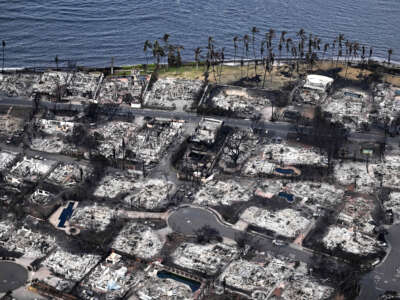 An aerial image taken on August 10, 2023, shows destroyed homes and buildings burned to the ground in Lahaina in the aftermath of wildfires in western Maui, Hawaii.