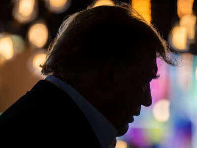 Republican presidential candidate and former President Donald Trump speaks during a rally at the Steer N' Stein bar at the Iowa State Fair on August 12, 2023, in Des Moines, Iowa.