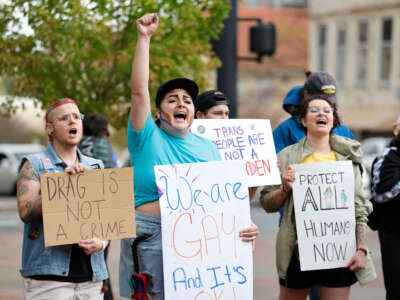 People cheer on a speaker during the Drag the Fascists rally at CCB Plaza in Durham, North Carolina, on April 1, 2023.