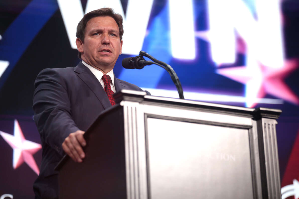 Florida Gov. Ron DeSantis speaks with attendees at a rally at Arizona Financial Theatre in Phoenix, Arizona, on August 14, 2022.