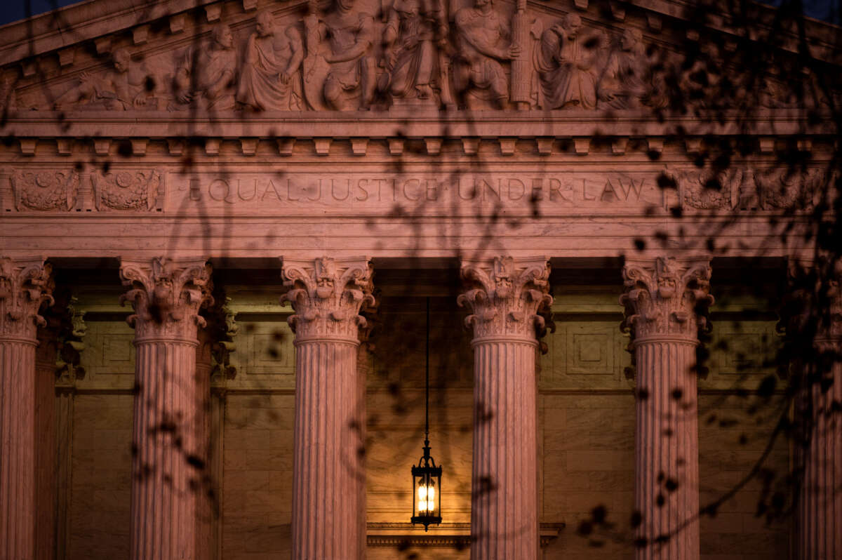 Sunset light illuminates the U.S. Supreme Court building on December 7, 2021.