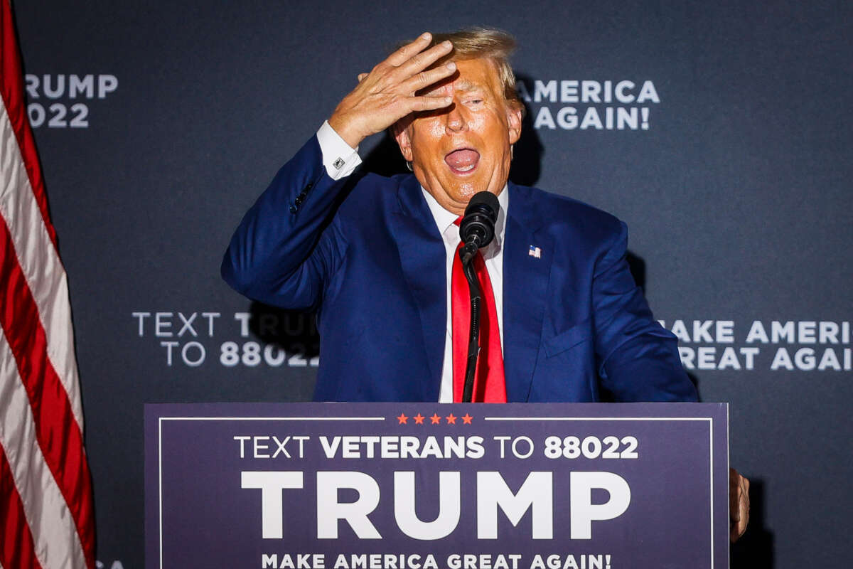 Former President Donald Trump delivers remarks at Windham High School in New Hampshire on August 8, 2023.