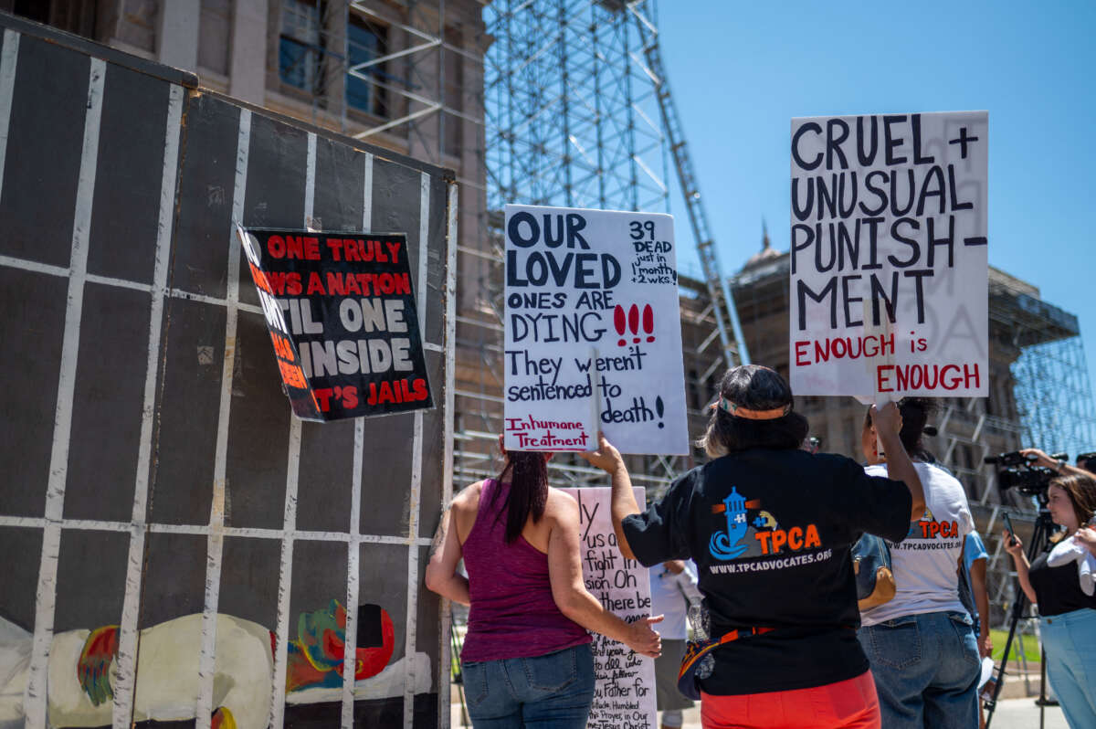 Protesters gather outside the Texas State Capitol building in Austin, Texas, on July 18, 2023. Activists visited the capitol to discuss the need for air conditioning in Texas state prisons, citing the harsh conditions and multiple deaths related to the heat and lack of relief from it.