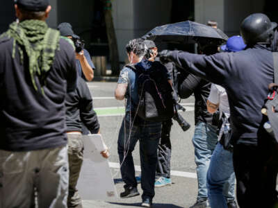 Andy Ngo is seen covered in an unknown substance on June 29, 2019, in Portland, Oregon.
