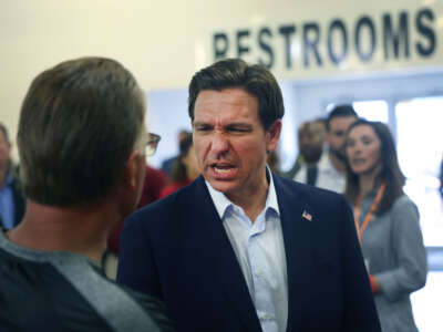 Republican presidential candidate Florida Gov. Ron DeSantis greets guests at Ashley's BBQ Bash on August 6, 2023, in Cedar Rapids, Iowa.