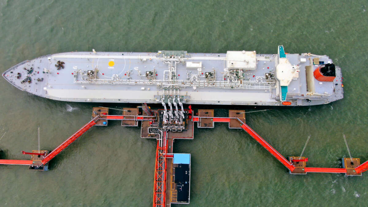 The LNG tanker Spirit of Hela is seen transmitting liquified natural gas (LNG) from Papua New Guinea at a reception terminal at Yangkou Port in Rudong County in China's Jiangsu province on July 23, 2020.