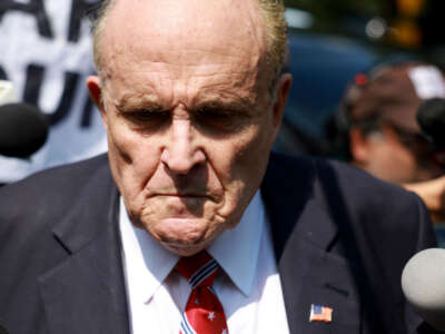 Rudy Giuliani speaks to the media after leaving the Fulton County jail on August 23, 2023, in Atlanta, Georgia.