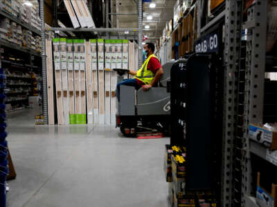 A worker at a Lowe's hardware store