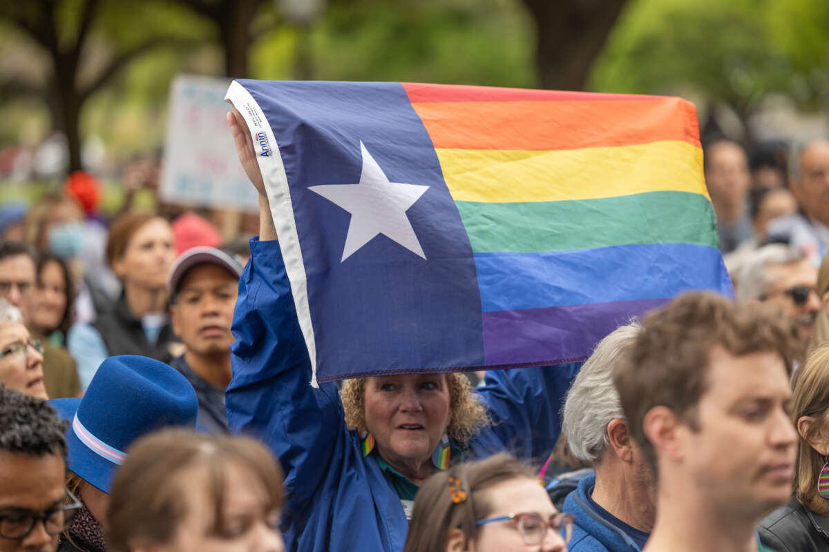Supporters of trans rights rally on the steps of the Texas Capitol in Austin, Texas, on March 20, 2023.