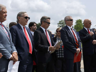 House Freedom Caucus members listen during a news conference on the progress of the Fiscal Year Appropriation Legislation outside the U.S. Capitol Building on July 25, 2023, in Washington, D.C.