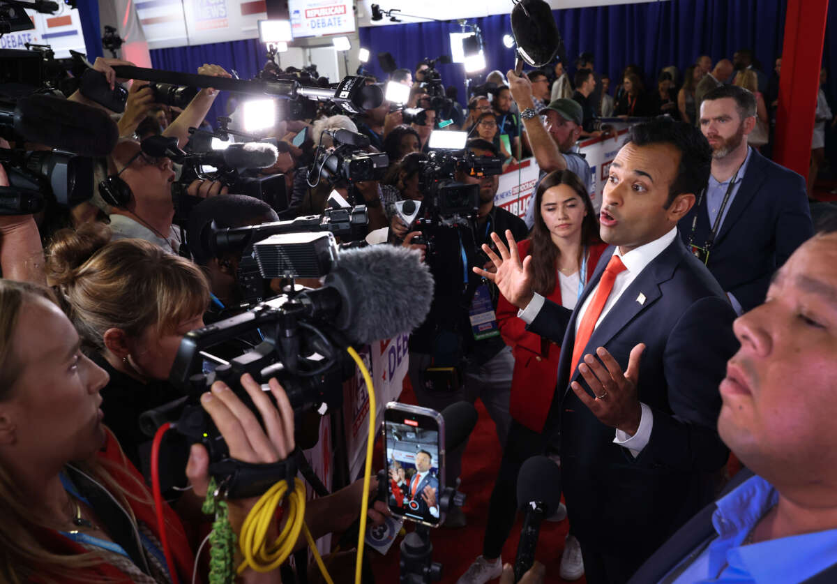 Republican presidential candidate Vivek Ramaswamy talks to members of the media in the spin room following the first debate of the GOP primary season hosted by FOX News at the Fiserv Forum on August 23, 2023, in Milwaukee, Wisconsin.