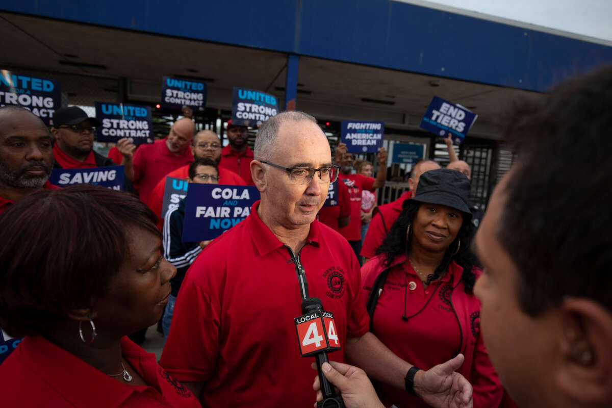 United Auto Workers president Shawn Fain speaks with Stellantis workers at the Stellantis Sterling Heights Assembly Plant on July 12, 2023, in Sterling Heights, Michigan.