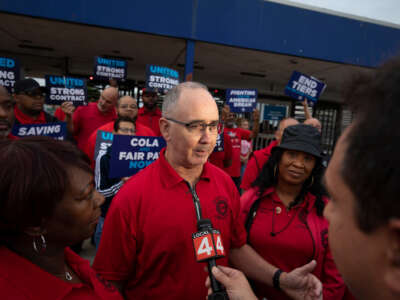 United Auto Workers president Shawn Fain speaks with Stellantis workers at the Stellantis Sterling Heights Assembly Plant on July 12, 2023, in Sterling Heights, Michigan.