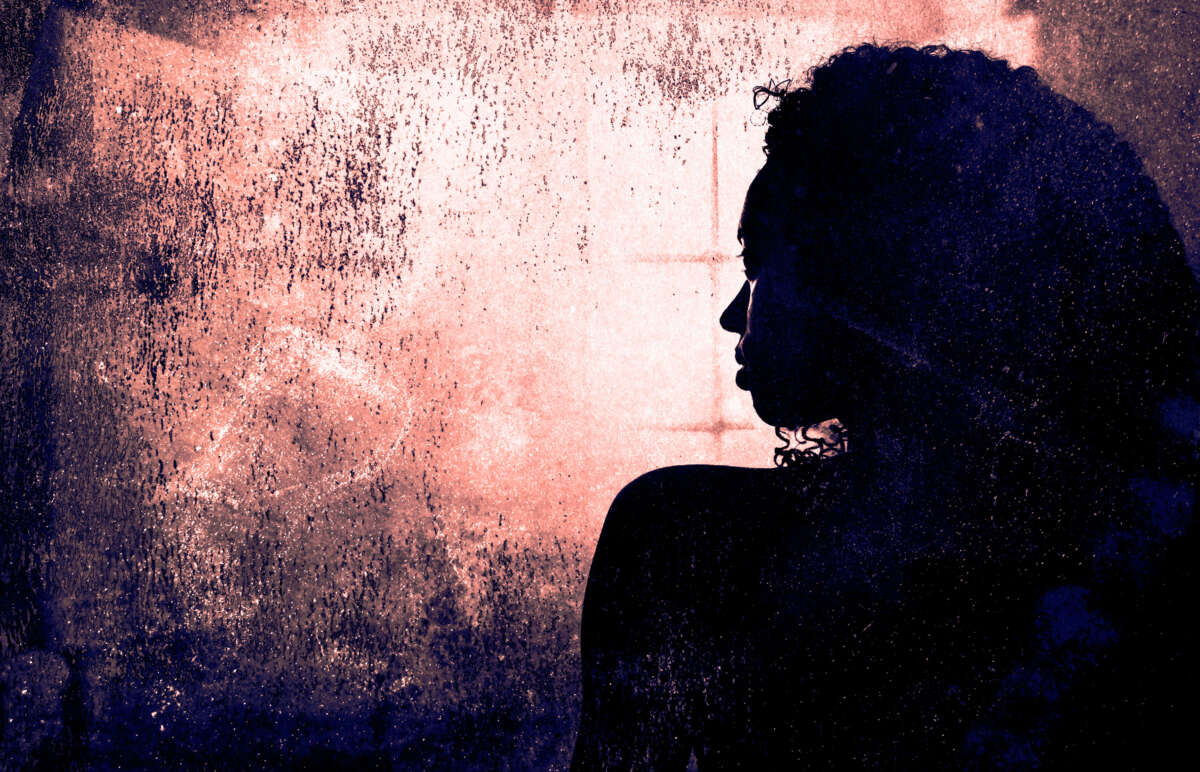 Woman in silhouette, backlit, distressed texture