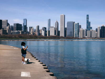 People walk along the lakefront on April 11, 2023, in Chicago, Illinois.