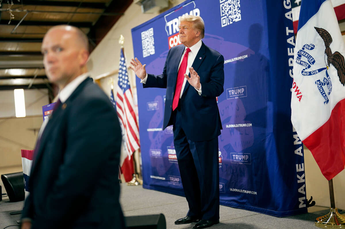 Former president Donald Trump arrives for a commit to caucus rally on September 20, 2023, at the Jackson County Fairgrounds in Maquoketa, Iowa.