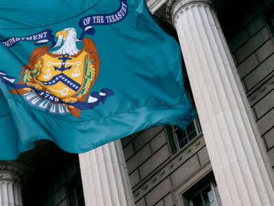 A flag with the seal of the Treasury Department flies outside the headquarters of the Internal Revenue Service on April 7, 2023, in Washington, D.C.