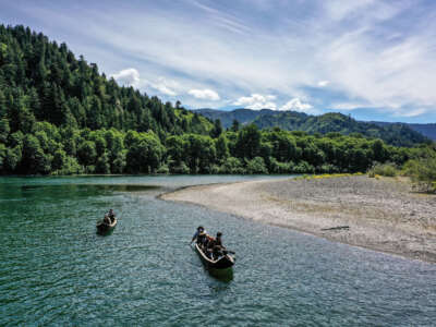 Yurok guides paddle tourists along the Klamath River in traditional canoes hand crafted from Redwood trees. Tribes in rural or remote areas like Yurok face drastic impacts from federal government shutdowns.